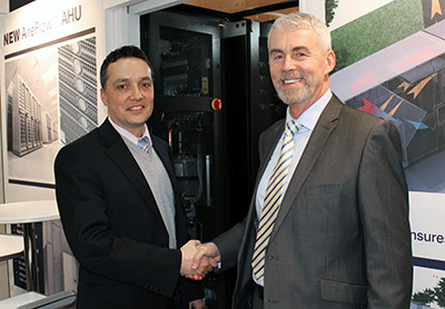 Matt McBurney (left), vice president commercial products group, Modine Manufacturing, seals the deal with Barry Phillips, Barkell co-founder and director