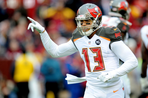 LANDOVER, MD - NOVEMBER 16: Wide receiver Mike Evans #13 of the Tampa Bay Buccaneers celebrates after catching a third quarter touchdown against the Washington Redskins at FedExField on November 16, 2014 in Landover, Maryland. (Photo by Mitchell Layton/Getty Images)