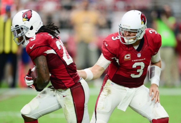 Sep 27, 2015; Glendale, AZ, USA; Arizona Cardinals quarterback Carson Palmer (3) hands off to Arizona Cardinals running back Chris Johnson (23) against the San Francisco 49ers at University of Phoenix Stadium. Mandatory Credit: Joe Camporeale-USA TODAY Sports
