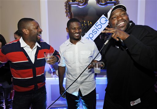 IMAGE DISTRIBUTED FOR PEPSI - D.J. Irie, left, laughs with NFL stars LaDainian Tomlinson and Warren Sapp, right, at the Pepsi 5th Quarter in the French Quarter Post Super Bowl Party, on Sunday, Feb. 3, 2013, in New Orleans. (Photo by Jack Dempsey/Invision for Pepsi/AP Images)