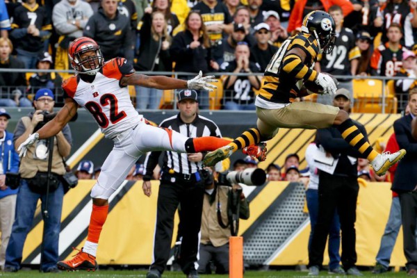 Pittsburgh Steelers cornerback Antwon Blake (41) intercepts a pass intended for Cincinnati Bengals wide receiver Marvin Jones (82) in the fourth quarter of an NFL football game, Sunday, Nov. 1, 2015, in Pittsburgh. The Bengals won 16-10. (AP Photo/Gene J. Puskar)