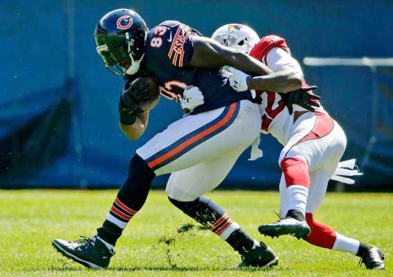 CHICAGO, IL - SEPTEMBER 20: Tony Jefferson #22 of the Arizona Cardinals tackles Martellus Bennett #83 of the Chicago Bears during the first half at Soldier Field on September 20, 2015 in Chicago, Illinois.The Arizona Cardinals won 48-23. (Photo by Jon Durr/Getty Images)