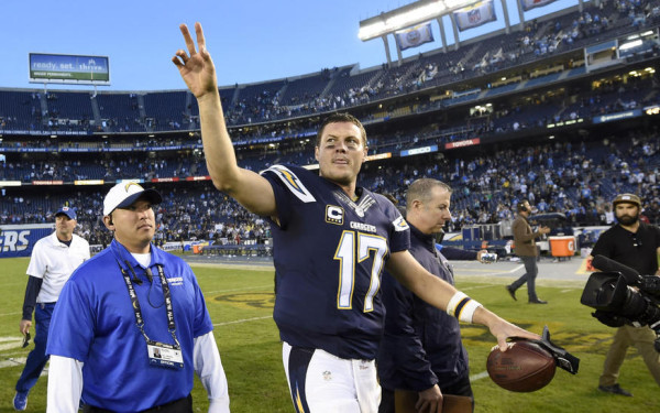 San Diego Chargers quarterback Philip Rivers leaves the field after their win against the Miami Dolphins in an NFL football game Sunday, Dec. 20, 2015, in San Diego. (AP Photo/Denis Poroy)