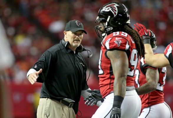 Nov 1, 2015; Atlanta, GA, USA; Atlanta Falcons head coach Dan Quinn (L) greets defensive end Adrian Clayborn (99) in the first quarter against the Tampa Bay Buccaneers at the Georgia Dome. Mandatory Credit: Jason Getz-USA TODAY Sports