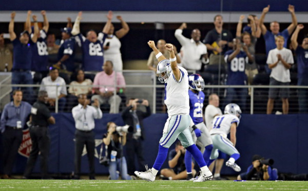 Dallas Cowboys quarterback Tony Romo his game-winning touchdown to tight end Jason Witten during the final seconds of a 27-26 win over the New York Giants Sunday, September 13, 2015 at AT&T Stadium in Arlington, Texas. (G.J. McCarthy/The Dallas Morning News)