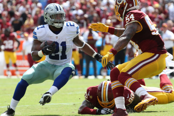 Sep 18, 2016; Landover, MD, USA; Dallas Cowboys running back Ezekiel Elliott (21) carries the ball as Washington Redskins linebacker Mason Foster (54) chases in the first quarter at FedEx Field. Mandatory Credit: Geoff Burke-USA TODAY Sports