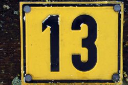 number-13-on-a-road-sign-thirteen