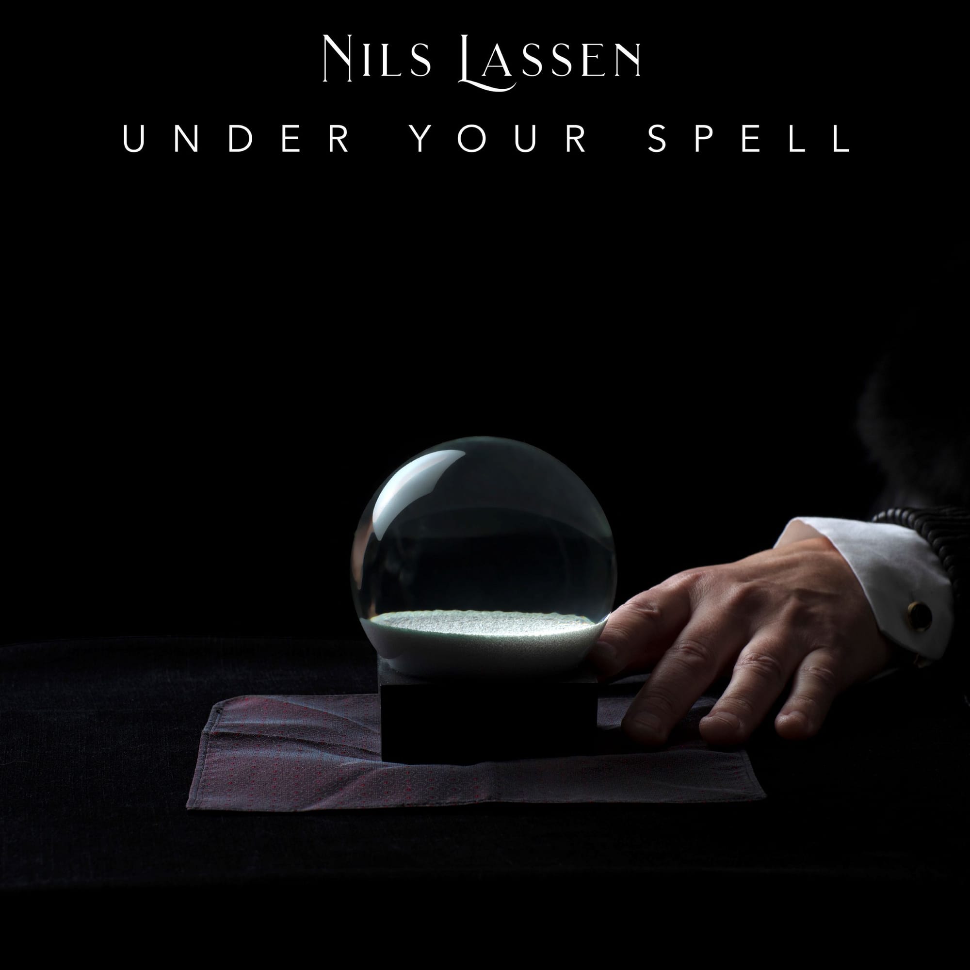 Nils Lassen announces "Under Your Spell" - first single from upcoming album "Rain Steam Speed"