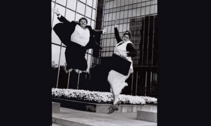 women-jumping-high-in-front-of-office Representation