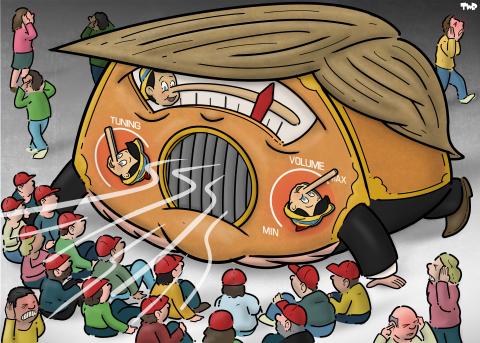 Cartoon showing a giant radio in the shape of Donald Trump. His mouth is a large, blaring, speaker. Two knobs, placed where his cheeks should be, are labeled ‘Tuning’ and ‘Volume’ and are shaped like heads of Pinocchio, with long noses indicating the position of the knobs. The volume is set to max. A large dial sits in place of the eyes; a red tie from the needle showing the frequency. People with red caps on have gathered around the radio, listening intently.