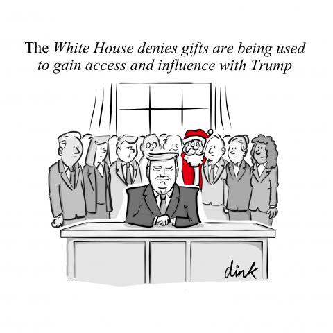 At his desk in The White House Trump is surrounded by supporters and advisors. among the crowd towards the back we can just glimpse Santa Claus.