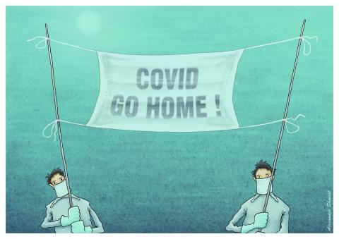A banner in the form of a medical mask. It has the inscription "COVID GO HOME!"