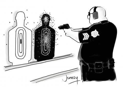 American policeman shooting at black target, ignoring the white one