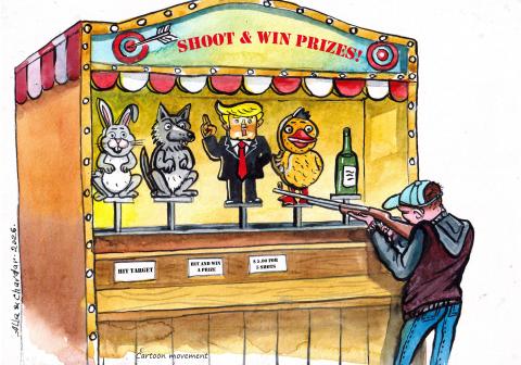 A Trump figurine has become a target at a shooting range in an amusement park.