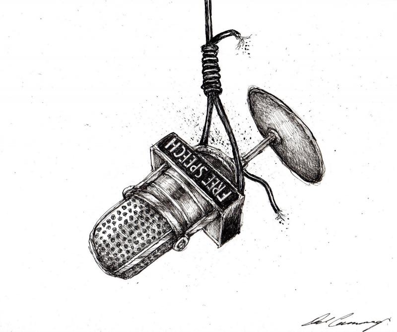 Microphone hanged by its cord.