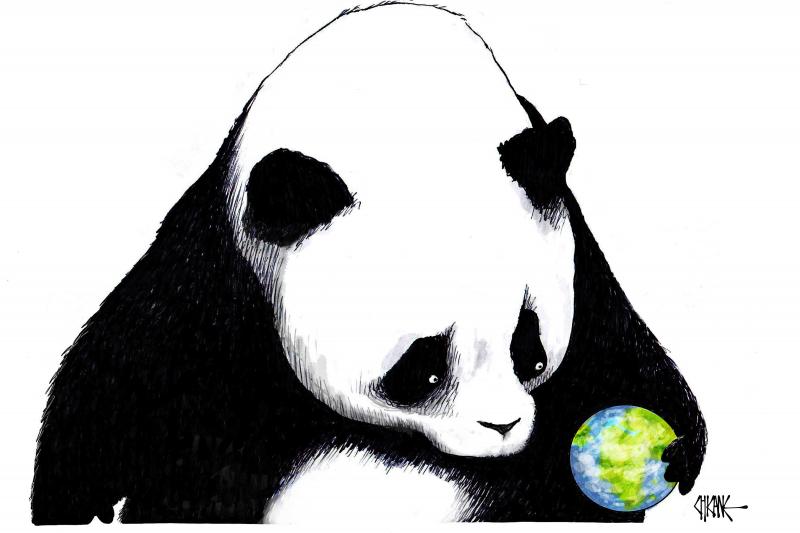 The panda bear, symbol of China, holds planet earth in its paw... contemplating