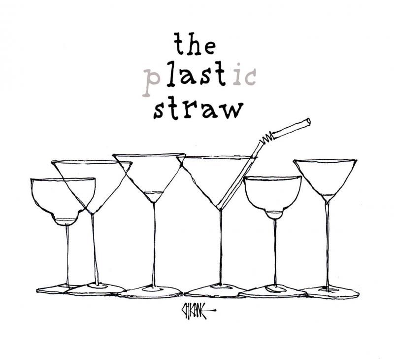 A single straw in an empty martini glass