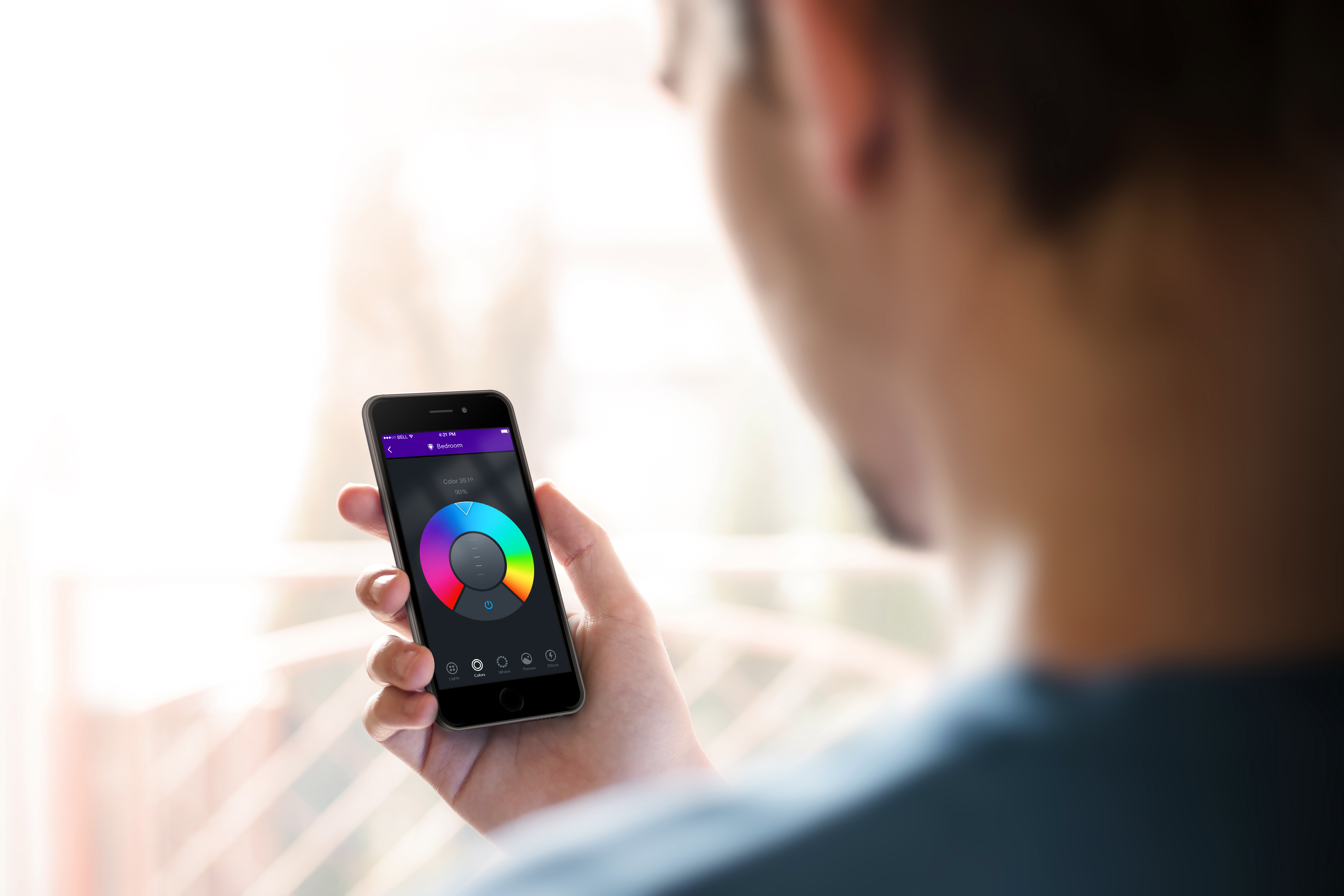 Holding iPhone Color App