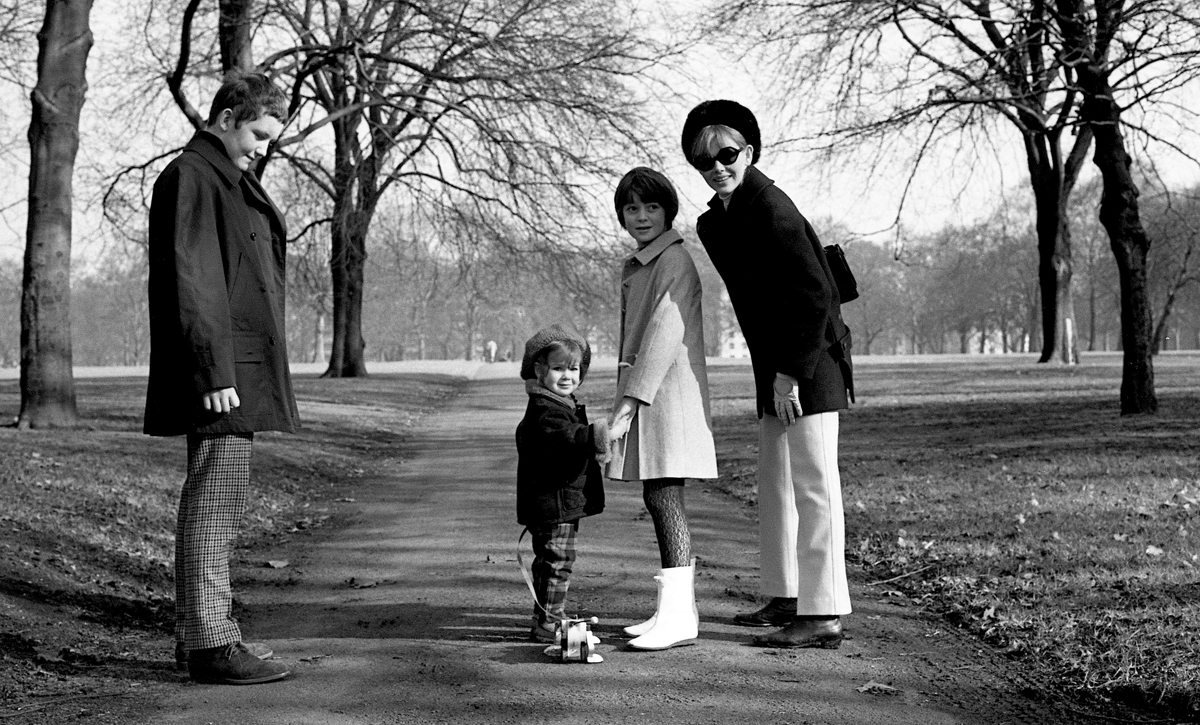 Michael, Victoria and Sarah Sellers with Britt Ekland in Hyde Park, 1967 © Sellers Family