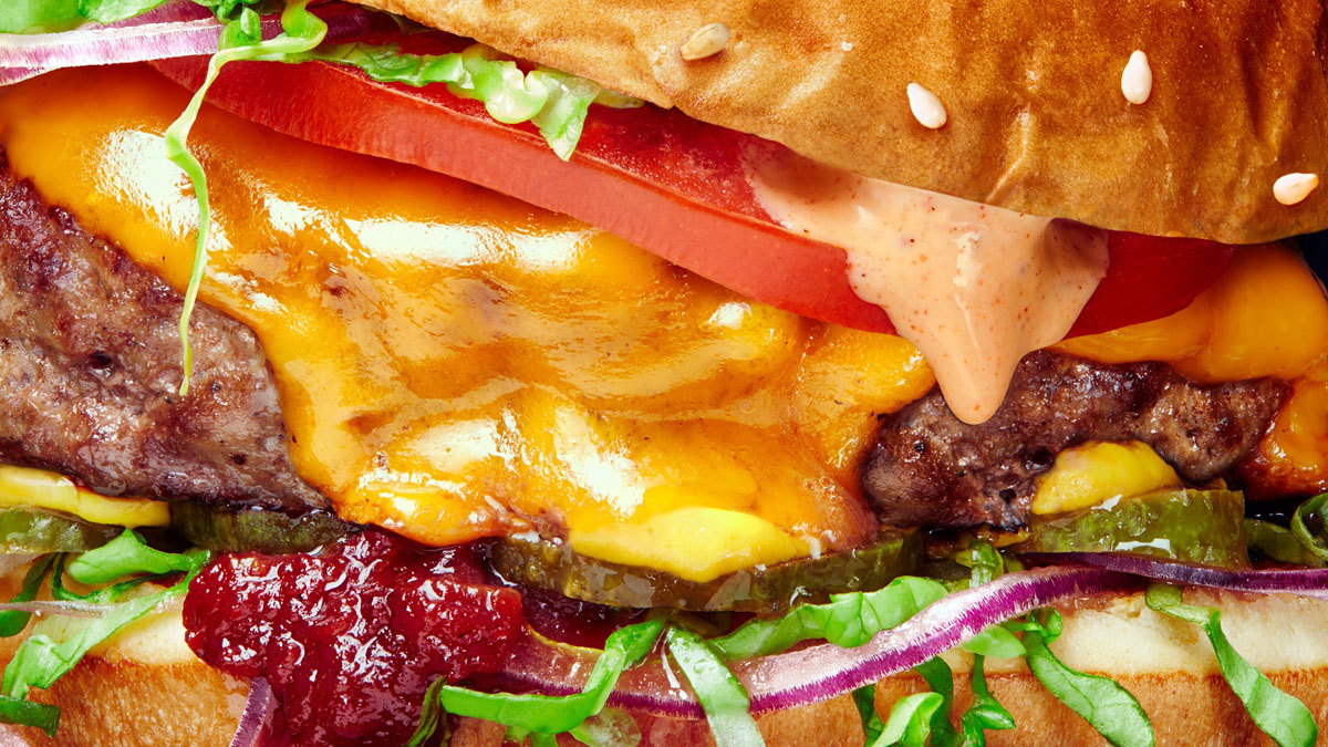 Deliveroo's new photography style features up-close images of food "in all its juicy, oozy, real-life detail"