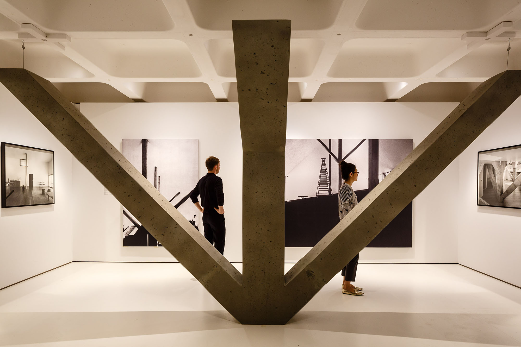 The exhibition includes a 1:1 reconstruction of the structural beams used by architect Kazuo Shinohara's House in Uehara (1976), a house created for photographer Kiyoji Ohtsuji. The main portion of the house is a concrete block with a lightweight steel structure on top