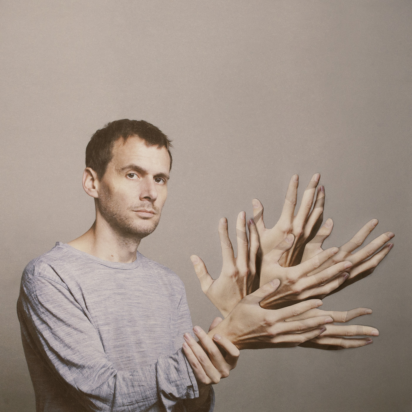 Cover art for Clark's 2013 album Feast Beast. Haser created the cover image by printing out multiple images of Clark's hands and laying them on top of one another