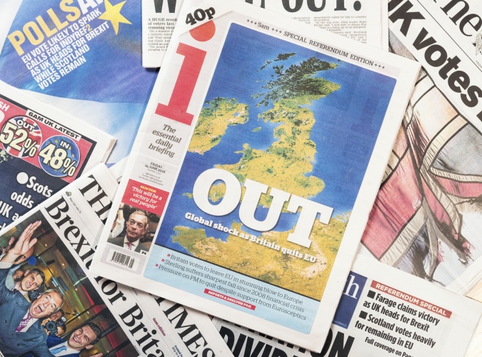 Edinburgh, UK - June 24, 2016: British newspaper front page headlines featuring the 'out' result in the British referendum on European Union membership held on 23rd June 2016.