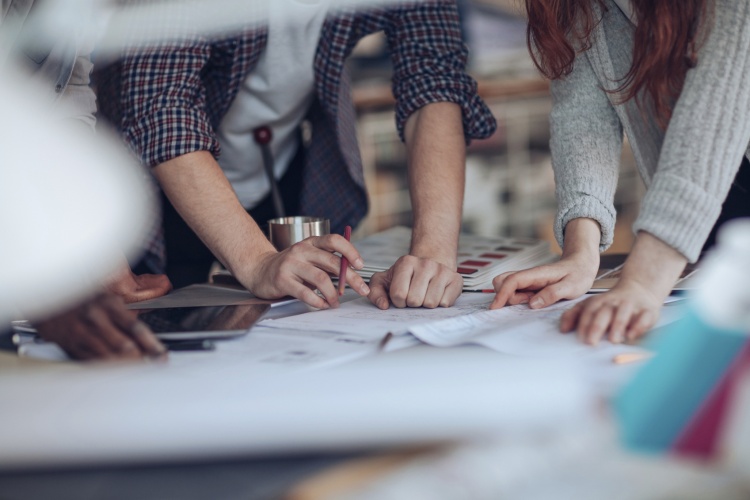 Close up of a designers working on a project