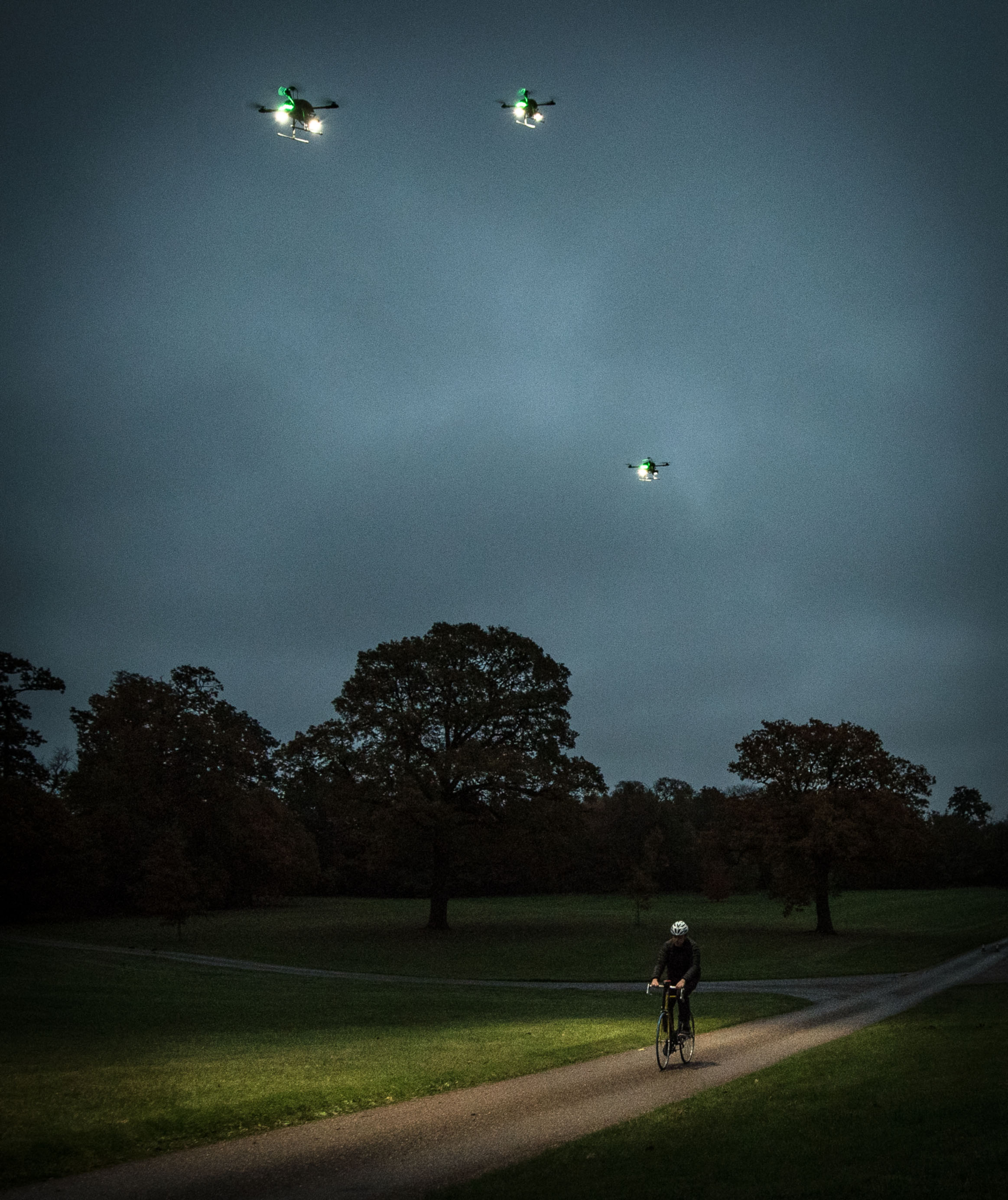 EMBARGOED TO 0001 WEDNESDAY NOVEMBER 16 EDITORIAL USE ONLY Cyclist Matt Ritz Wright during the launch of ÔFleetlightsÕ Ð a prototype range of smart drones fitted with high-powered lights, which have been designed by Direct Line and can be ordered by phone to improve road and pedestrian safety at night, at Borehamwood, Hertfordshire. PRESS ASSOCIATION Photo. Issue date: Wednesday November 16, 2016. The insurance provider has partnered with the drone technology specialists behind Mission Planner to create the prototype Fleetlights mobile phone app, which makes it simple to control the service and track your journey using your GPS location. The software is the first time the ÔLight my WayÕ functionality - which tracks and maintains a fixed distance ahead of a subject, rather than behind - has been used. Photo credit should read: John Nguyen/PA Wire