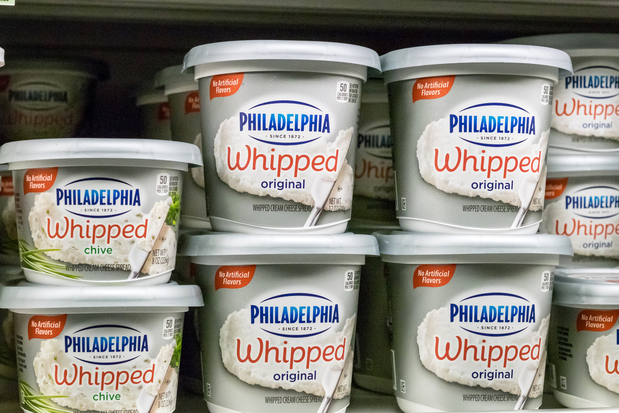 Miami,Florida, USA - January 15, 2016: containers of Kraft Philadelphia Original Cream Cheese in a cooler. Kraft Foods Group is an American multinational confectionery, food and beverage conglomerate. The company is headquartered in Northfield, Illinois.