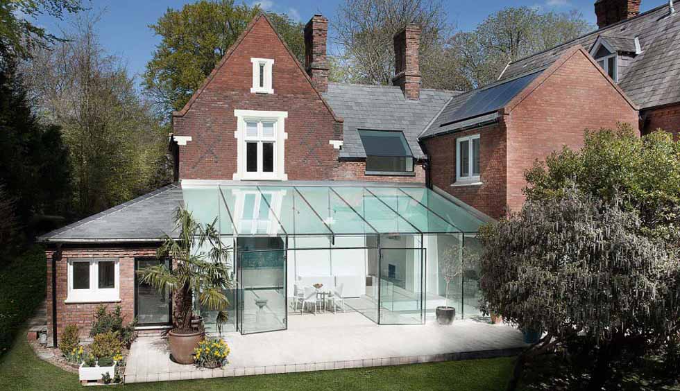 Frameless glass extension to a Victorian house