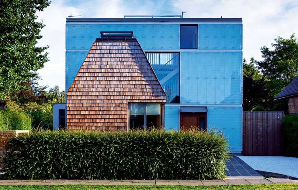 A timber structure self build house made up of prefabricated solid timber panels