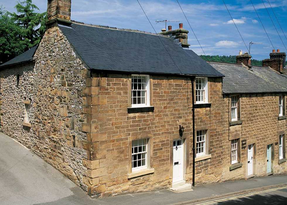The Party Wall Act had to be considered when renovating this Grade II Listed cottage at the end of a row of terraced houses