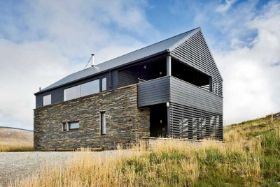 A timber clad beach house in the Hebrides