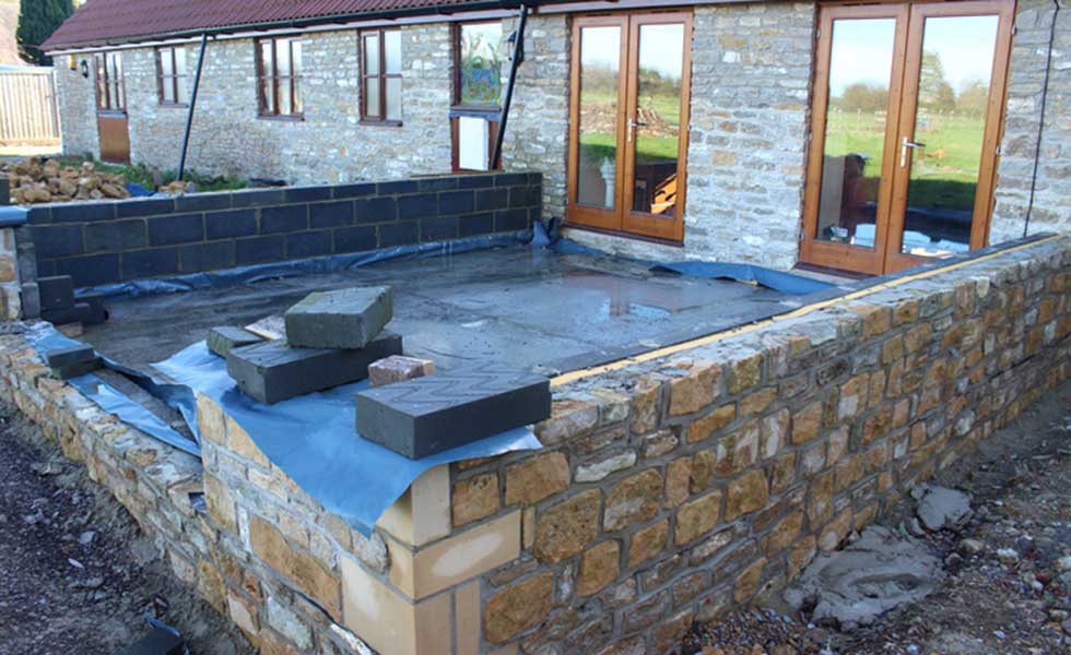 blockwork extension clad in stone
