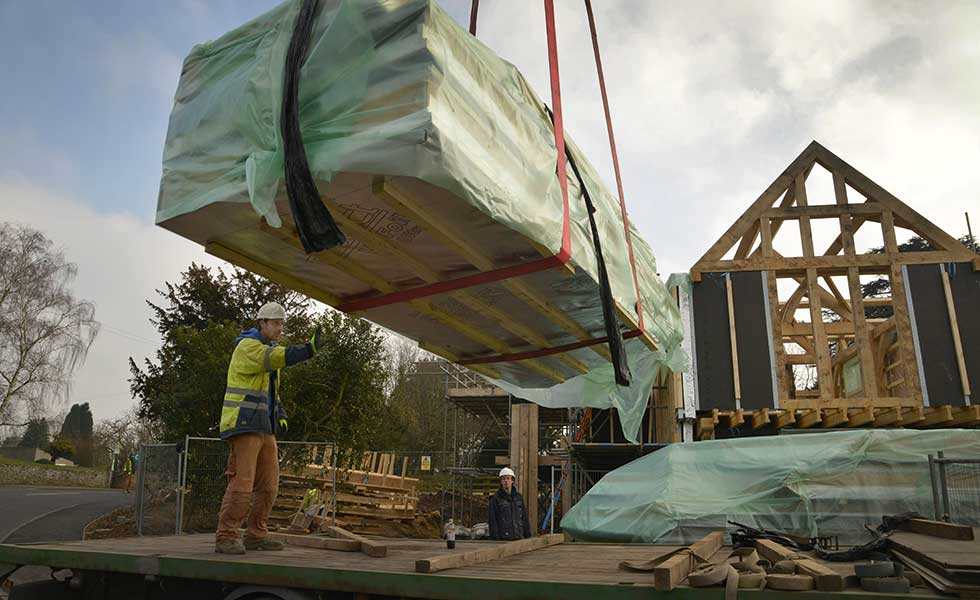 modern oak frame home being built