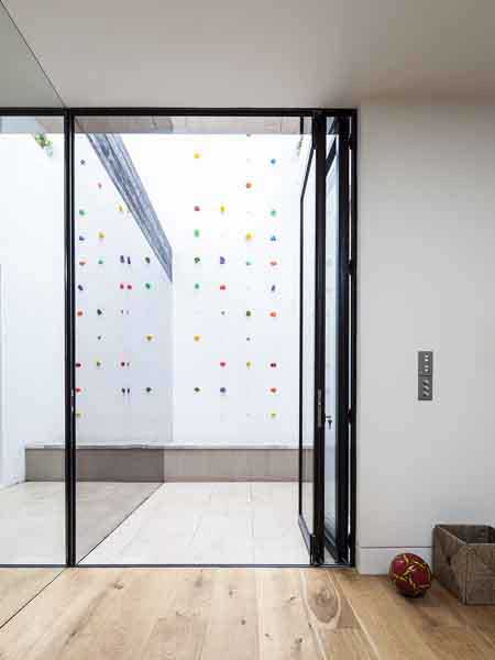 climbing wall from basement in a London home