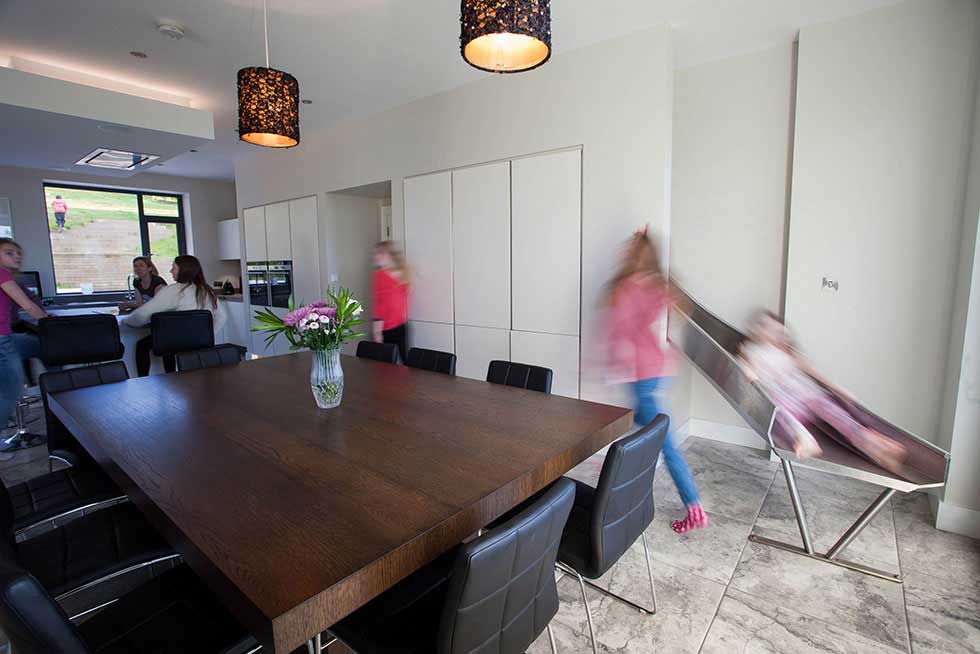 slide into an open plan kitchen in a family home in Ireland