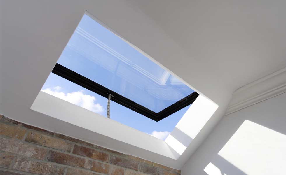 reflex glass skylight black with exposed brick