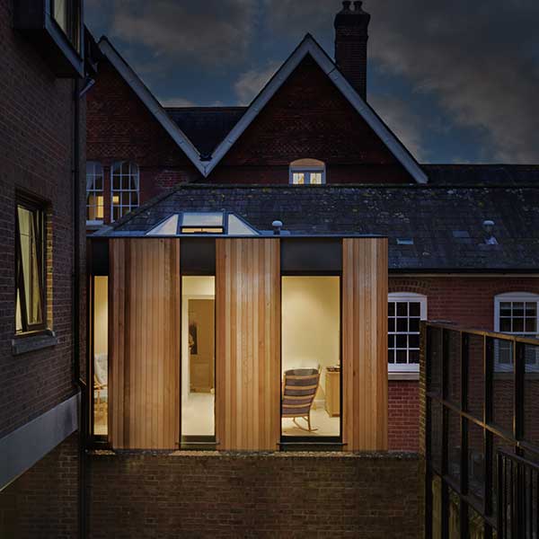 wooden panelled and glass modern extension