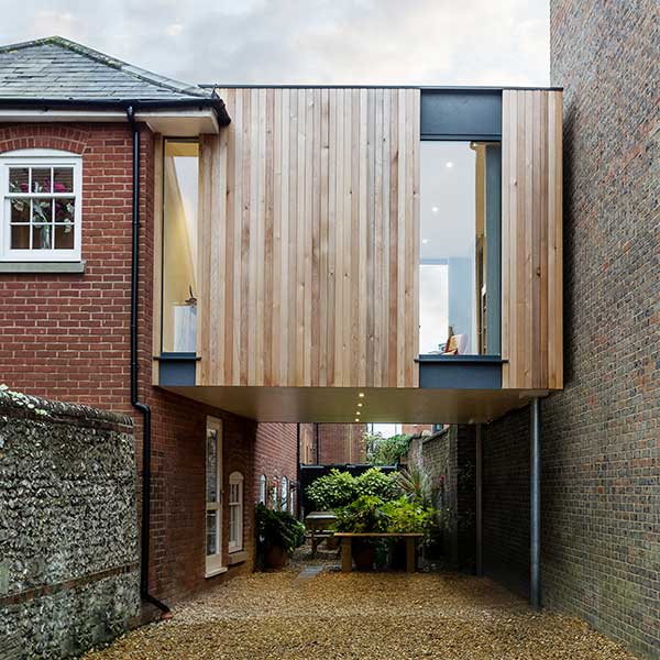 modern wooden panelled and glass extension