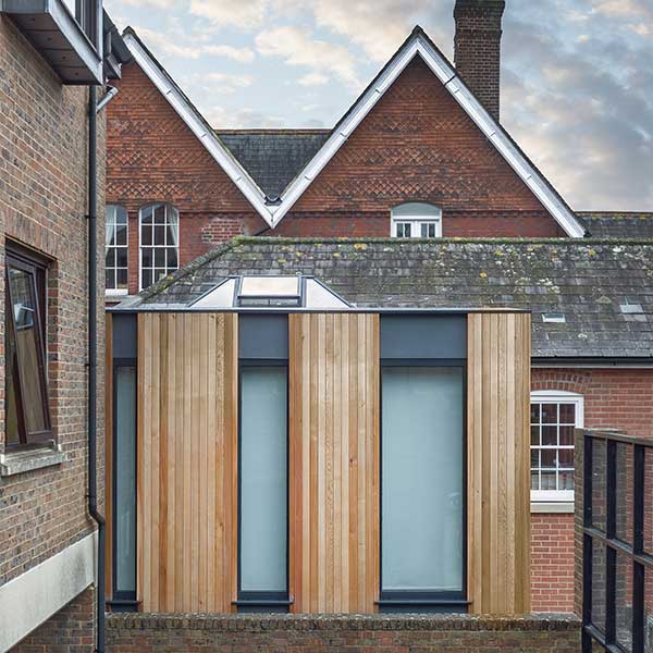 modern wooden panelled and glass extension