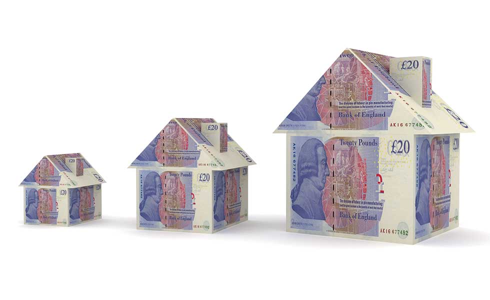 image of homes built from twenty pound notes to represent mortgages