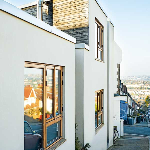 contemporary white home with wooden features