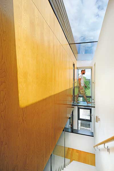 Glazed link between bedroom and dressing space