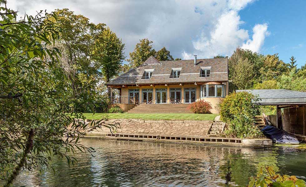 colonial style riverside home