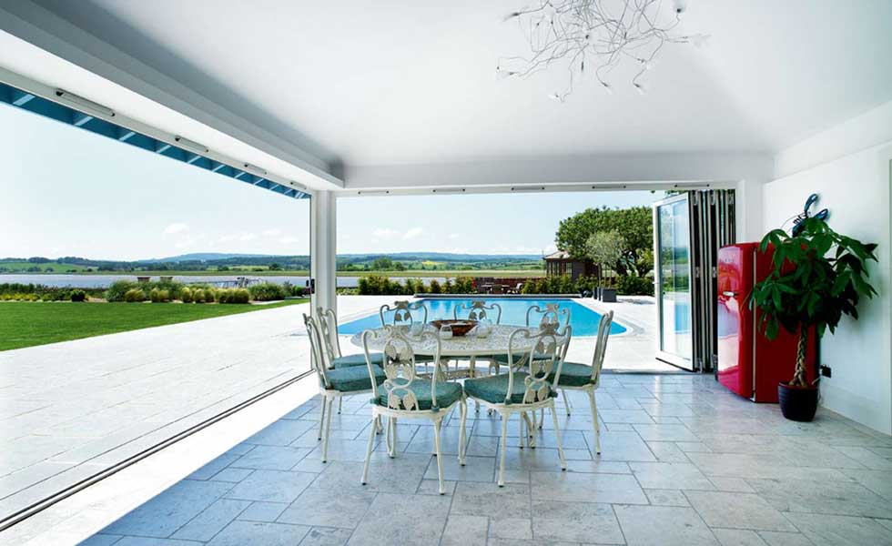 view of river from open dining space overlooking pool
