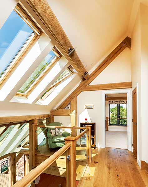 glazed balustrade and galleried landing with Velux windows