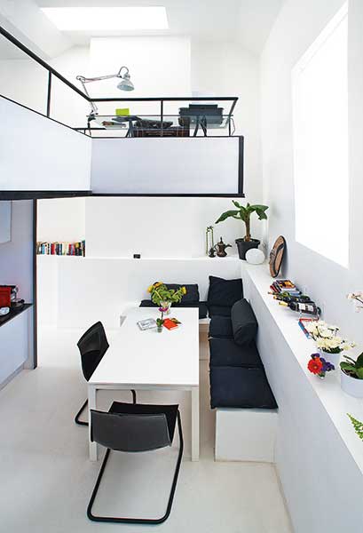 small home living space with mezzanine floor