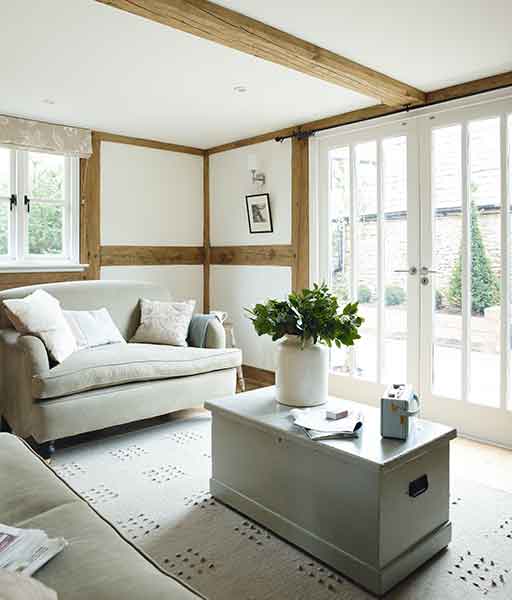 A stylish budget build features elements of exposed oak frame in the interiors